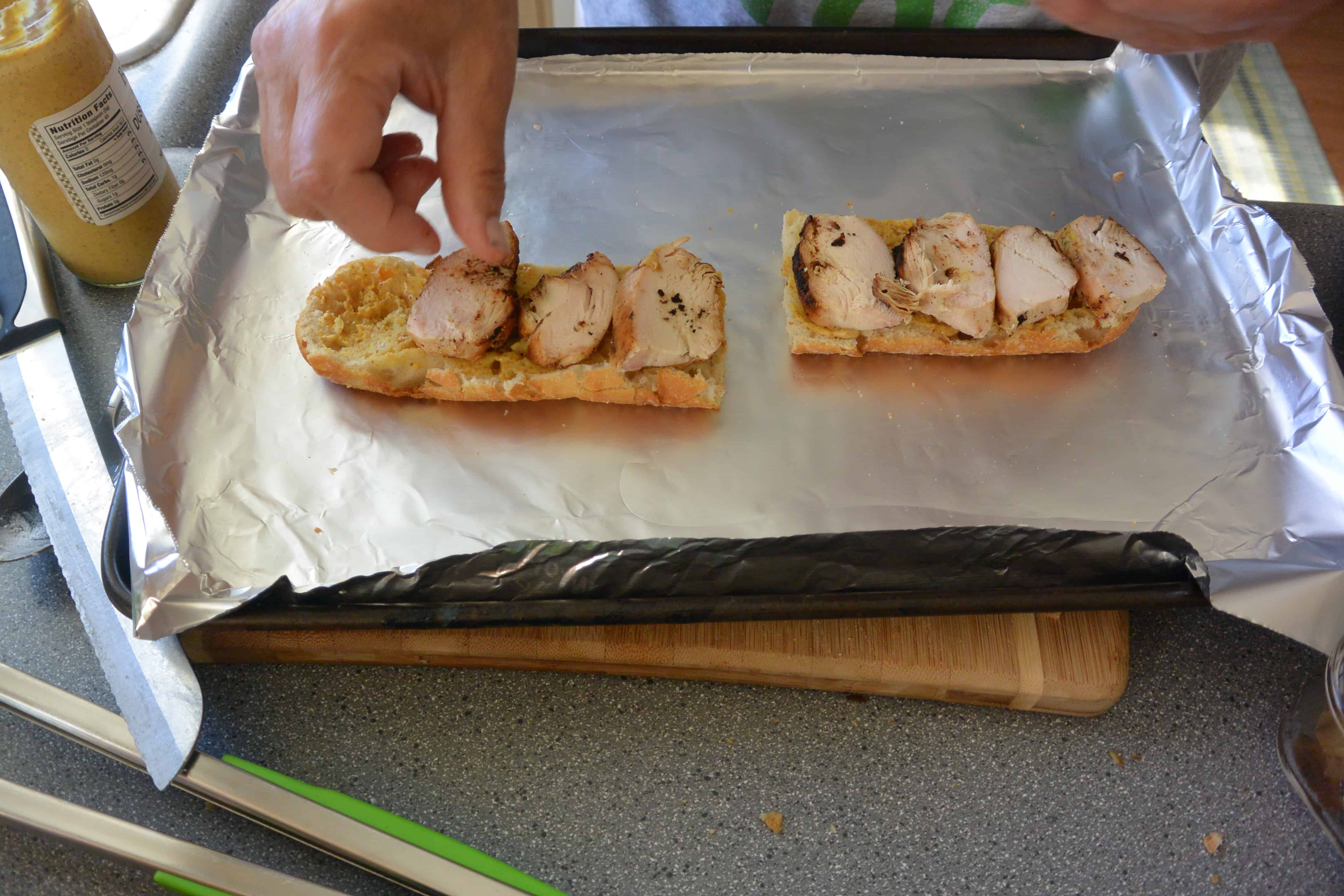 Chicken is placed on a bun