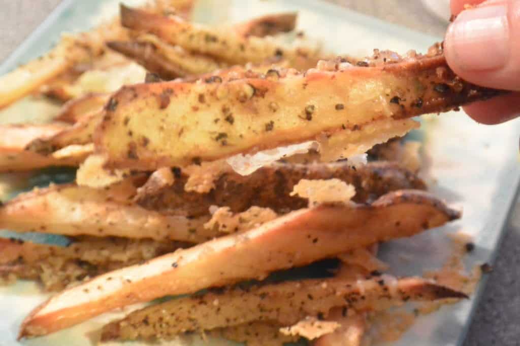 Crunchy oven baked french fries with parmesan Cheese