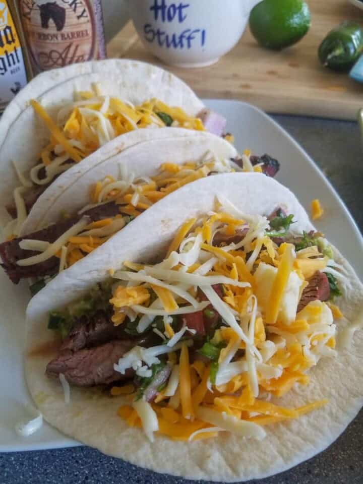 Tacos with cheese and steak