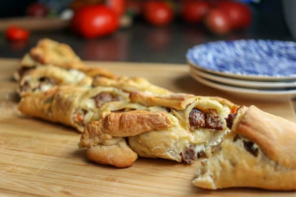 Sausage Cheese Stuffed Bread cut on a cutting board