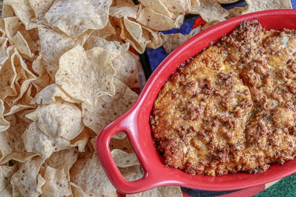 Chip dip in a casserole dish with chips