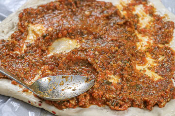 Homemade Pizza with Tomato and Pesto Ricotta Sauce