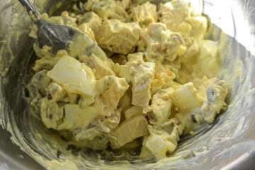 A bowl of food with chicken salad