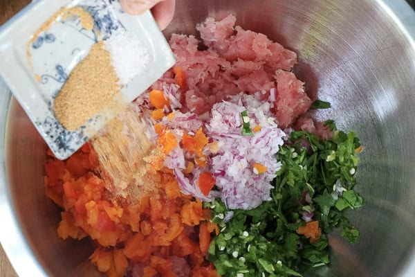 A bowl of tuna with herbs
