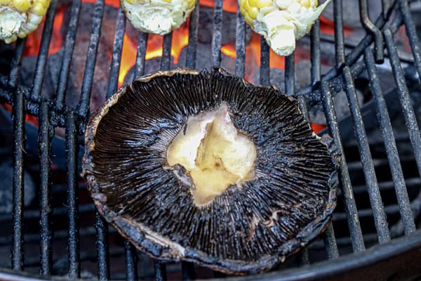 A mushroom and corn on the grill