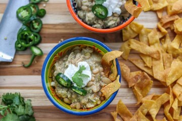 2 bowls of white bean chili with corn chips
