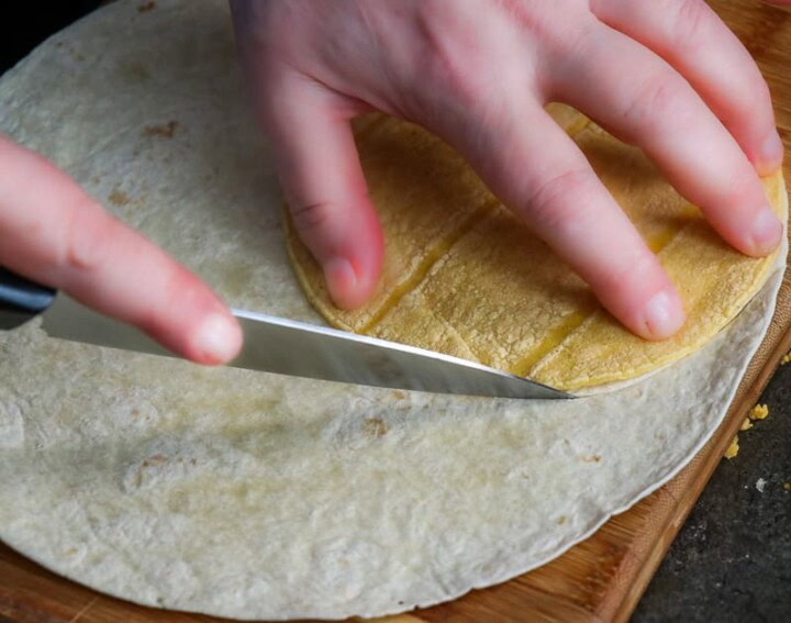Flour and corn tortilla cutting it round