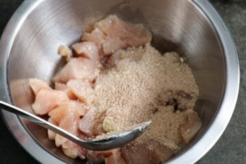 Making Air Fryer Garlic Parmesan Chicken Nuggets