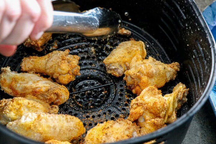 Flipping chicken wings in air fryer