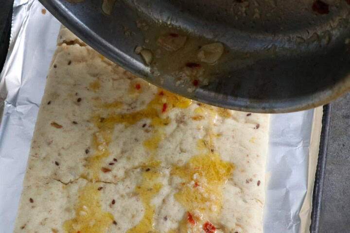 Flat Bread Pizza  with olive oil sauce poured on