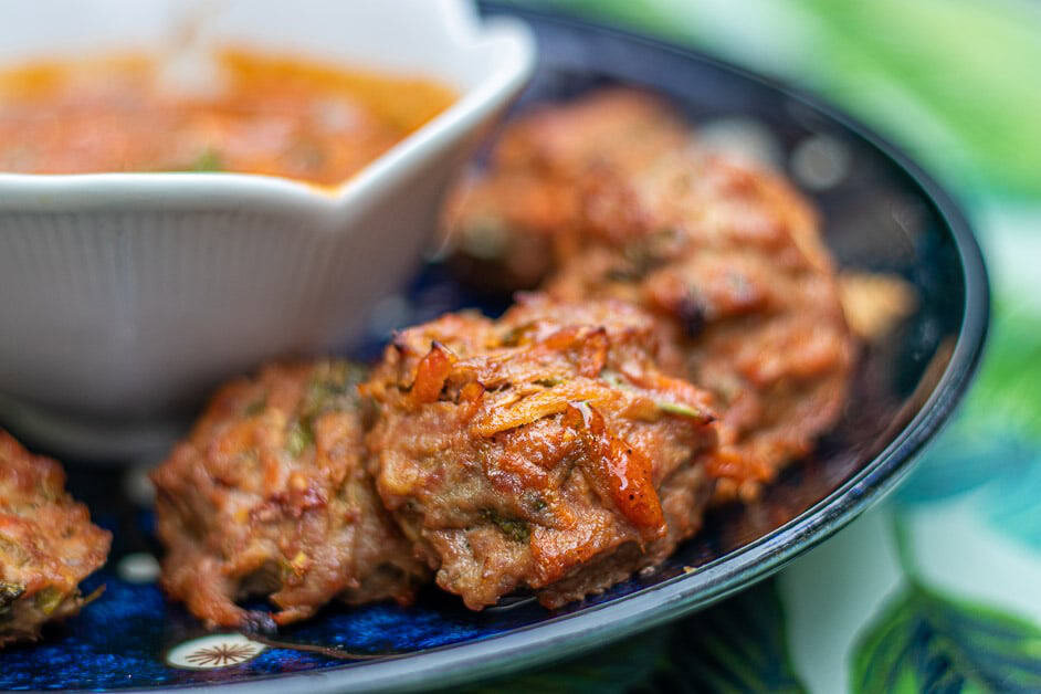 Thai Turkey Meatballs on a plate with dipping sauce