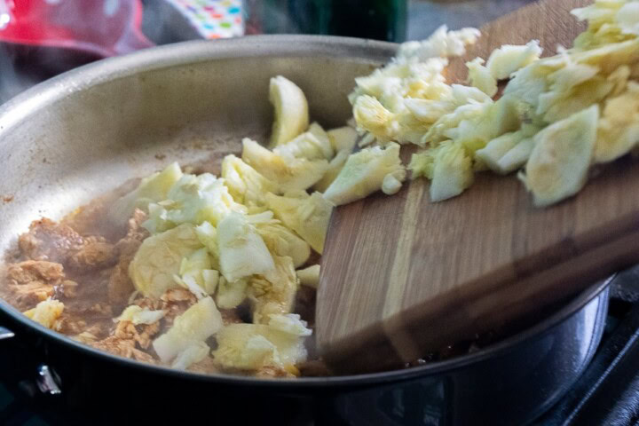 Patty pan pieces in a pan