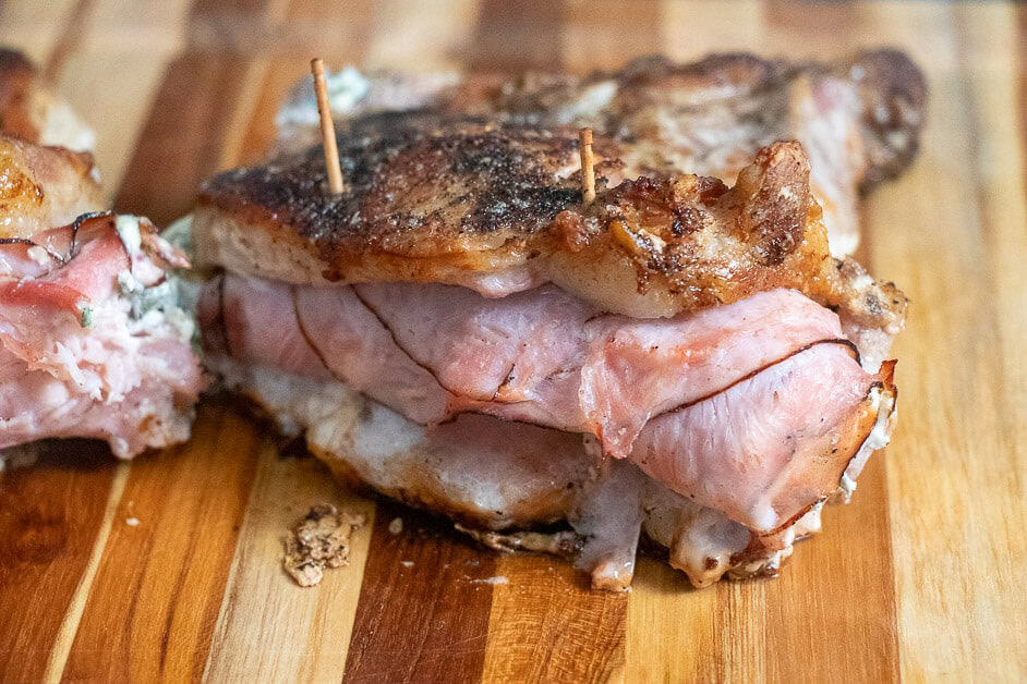 Stuffed Pork Chop on cutting board