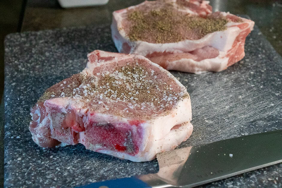 Pork chops seasoned ith salt and pepper