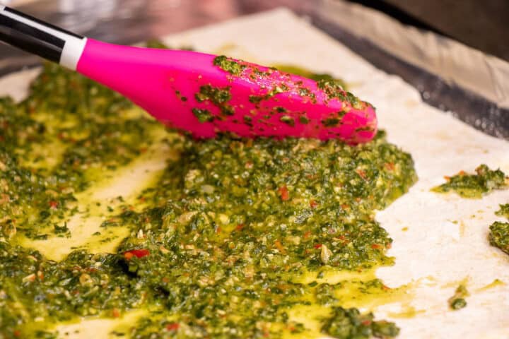 Pesto on pizza crust