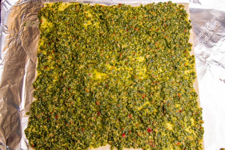 Pesto on pizza crust