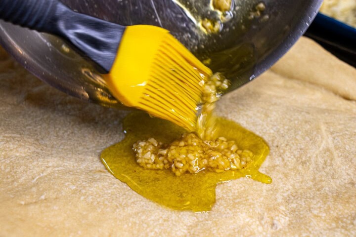 Pizza Crust with garlic olive oil with brush