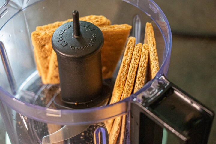 A blender with graham crackers