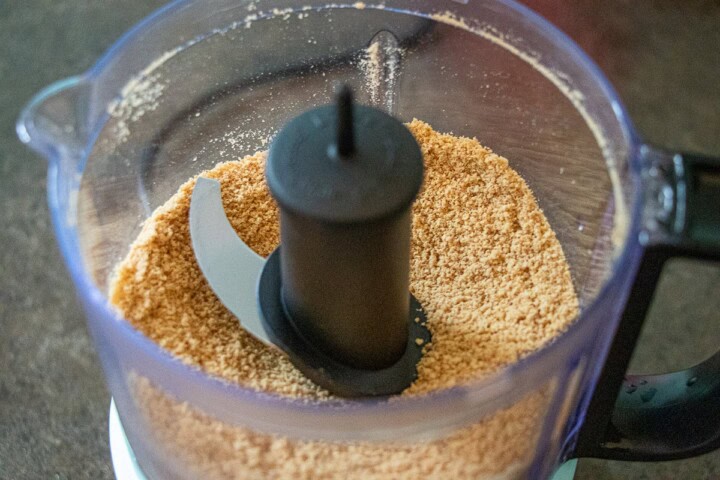 A blender with a brown substance in it