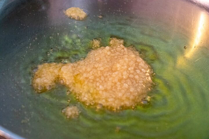 Garlic in oil in a pan