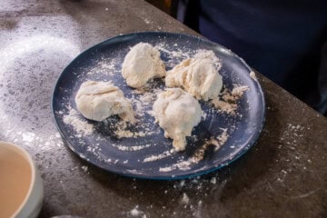 Dough is cut into four balls