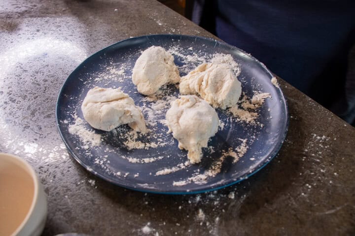 Dough is cut into four balls