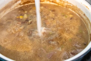 Cornstarch slurry poured into pot pie mixture