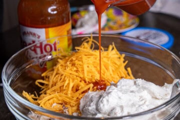 Cottage Cheese, Cheddar cheese, Franks hots sauce, chicken in a bowl