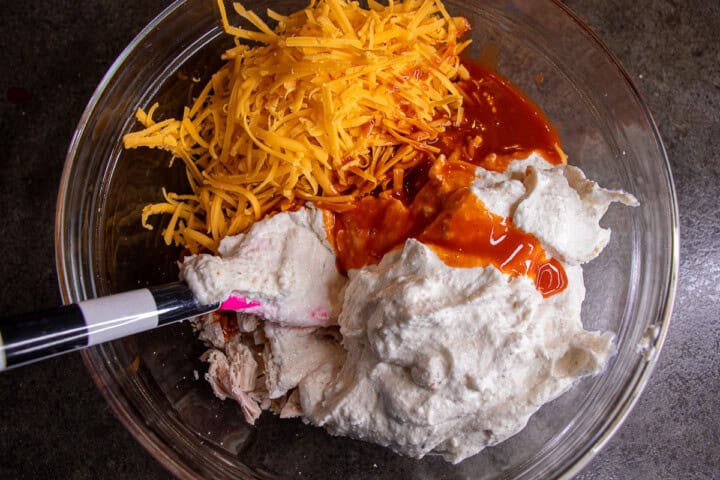Cottage Cheese, Cheddar cheese, Franks hots sauce, chicken in a bowl