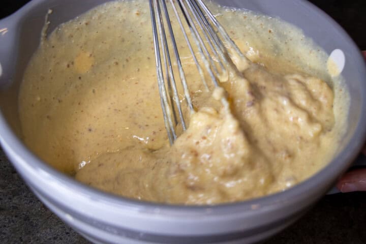 Banana Bread in a bowl with a whisk
