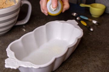 Loaf pan with cooking spray