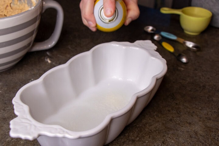 Loaf pan with cooking spray
