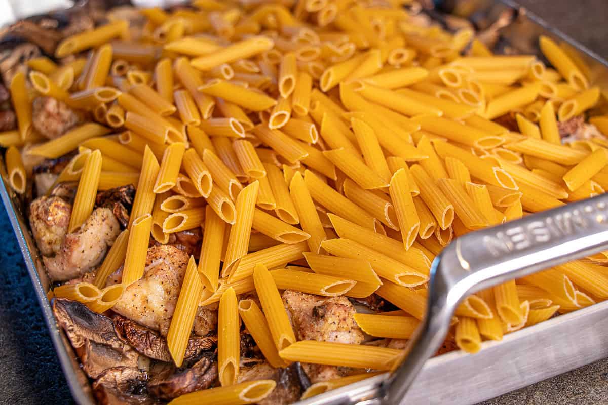 Pasta added to roasting pan